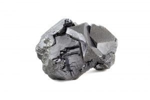 A lump of pure lead ore on a white background